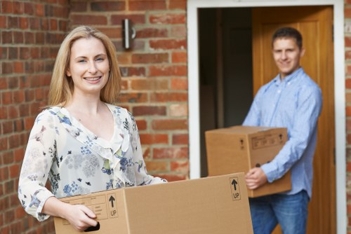 Careful loading of household items during a North London relocation