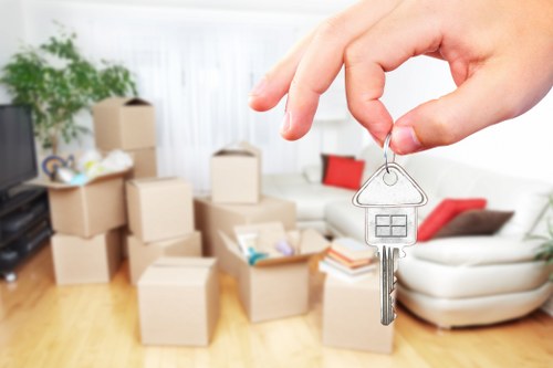 Careful loading of household furniture by a removals team in Tufnell Park