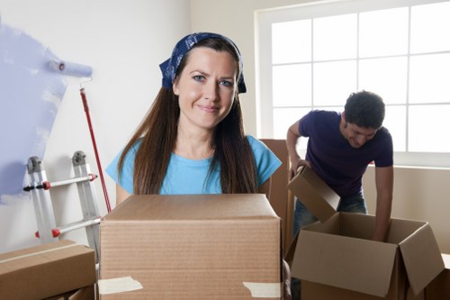 Careful transport of a piano by local movers in north London