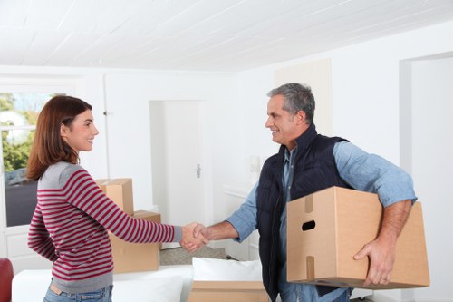 Local office movers handling equipment and packing for a business move in north London