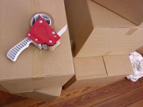 Boxes and furniture being loaded for a local apartment move