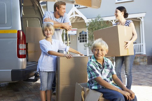 Local man and van loading household items for transport