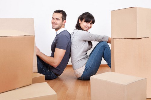 Loading household items into a removal truck for a north London move